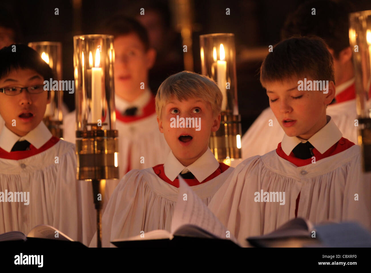 KING'S COLLEGE CHOIR BOYS PREPARING FOR THE CHRISTMAS EVE SERVICE AT
