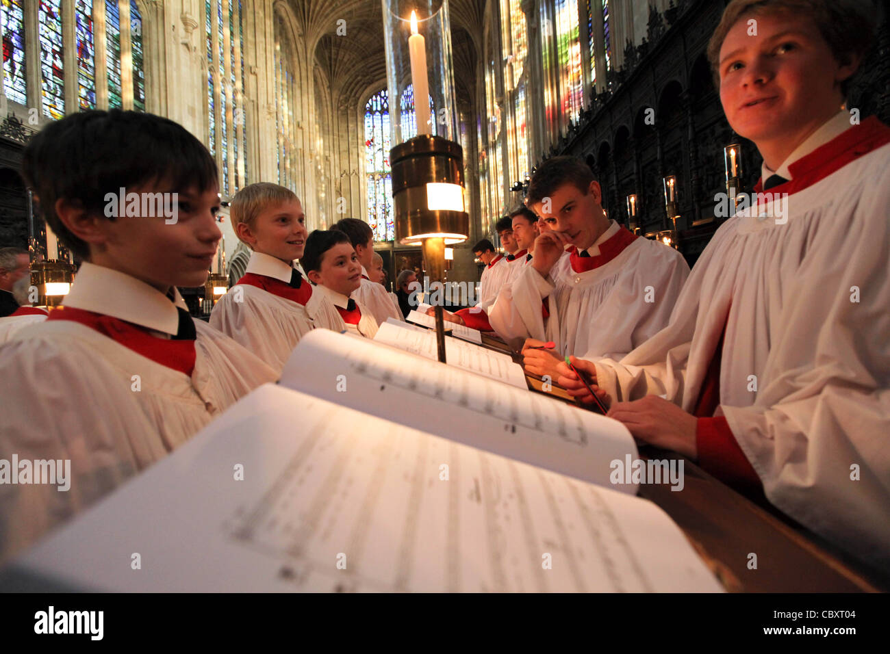 KING'S COLLEGE CHOIR BOYS PREPARING FOR THE CHRISTMAS EVE SERVICE AT