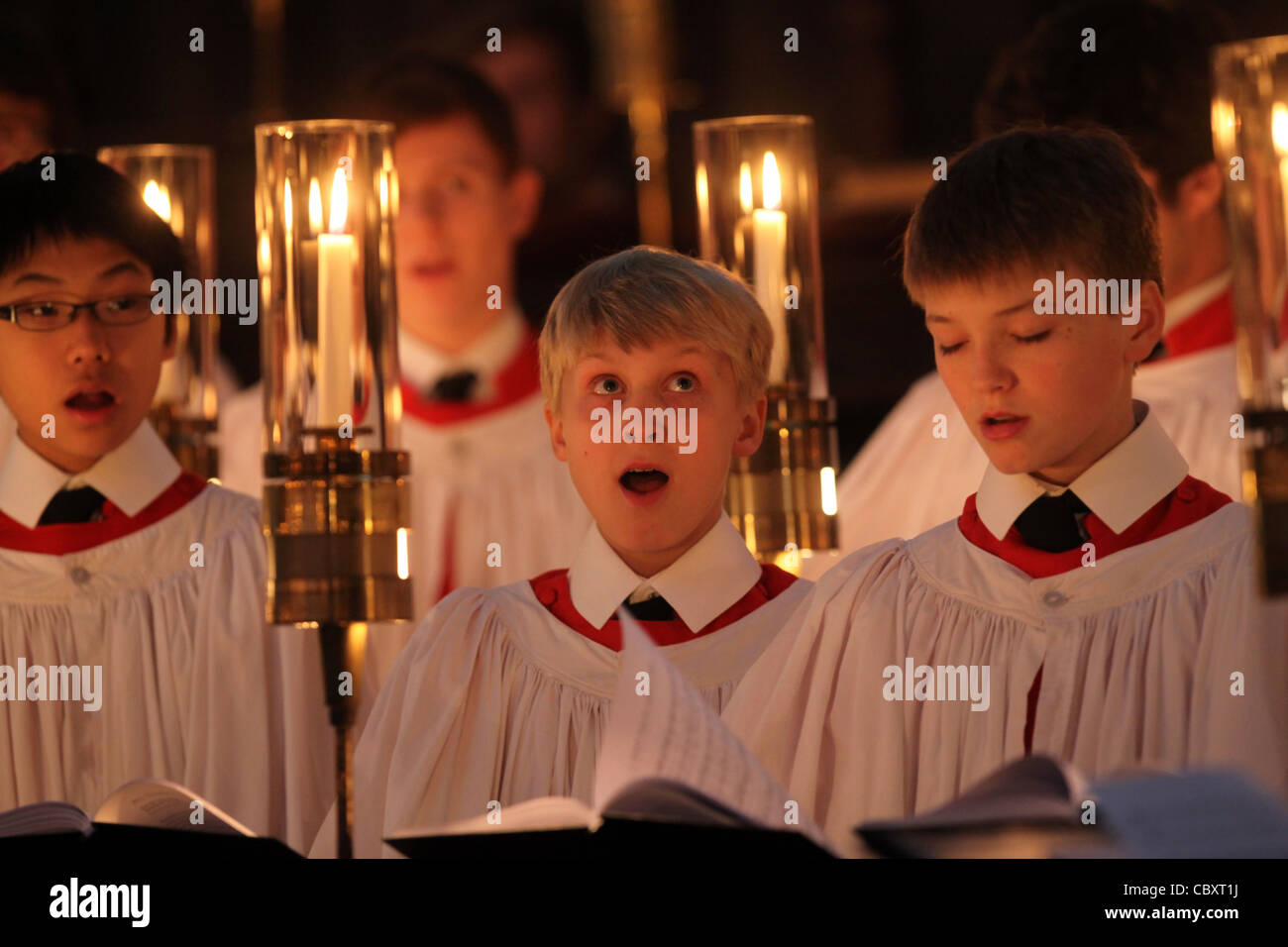 KING'S COLLEGE CHOIR BOYS PREPARING FOR THE CHRISTMAS EVE SERVICE AT