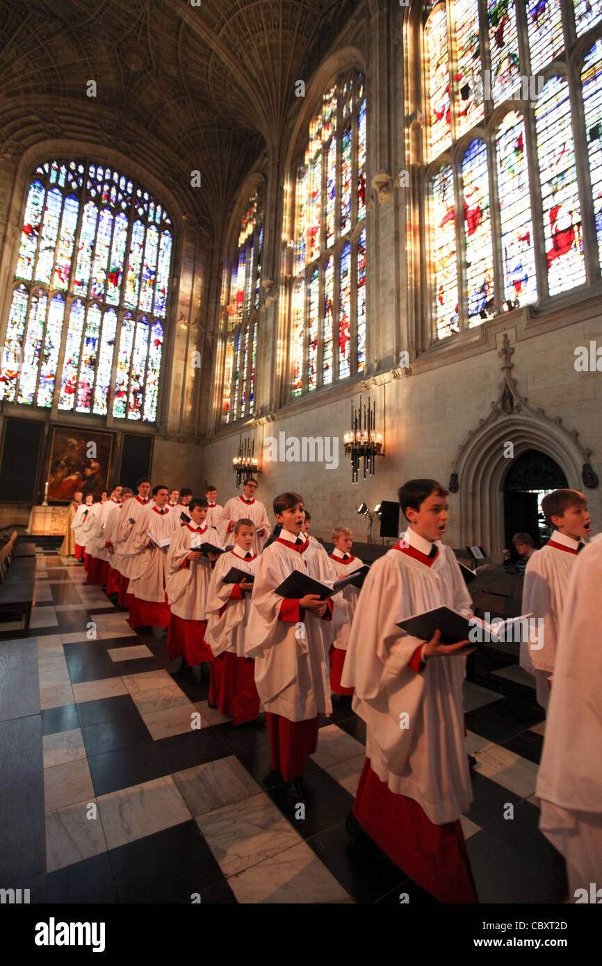 KING'S COLLEGE CHOIR BOYS PREPARING FOR THE CHRISTMAS EVE SERVICE AT