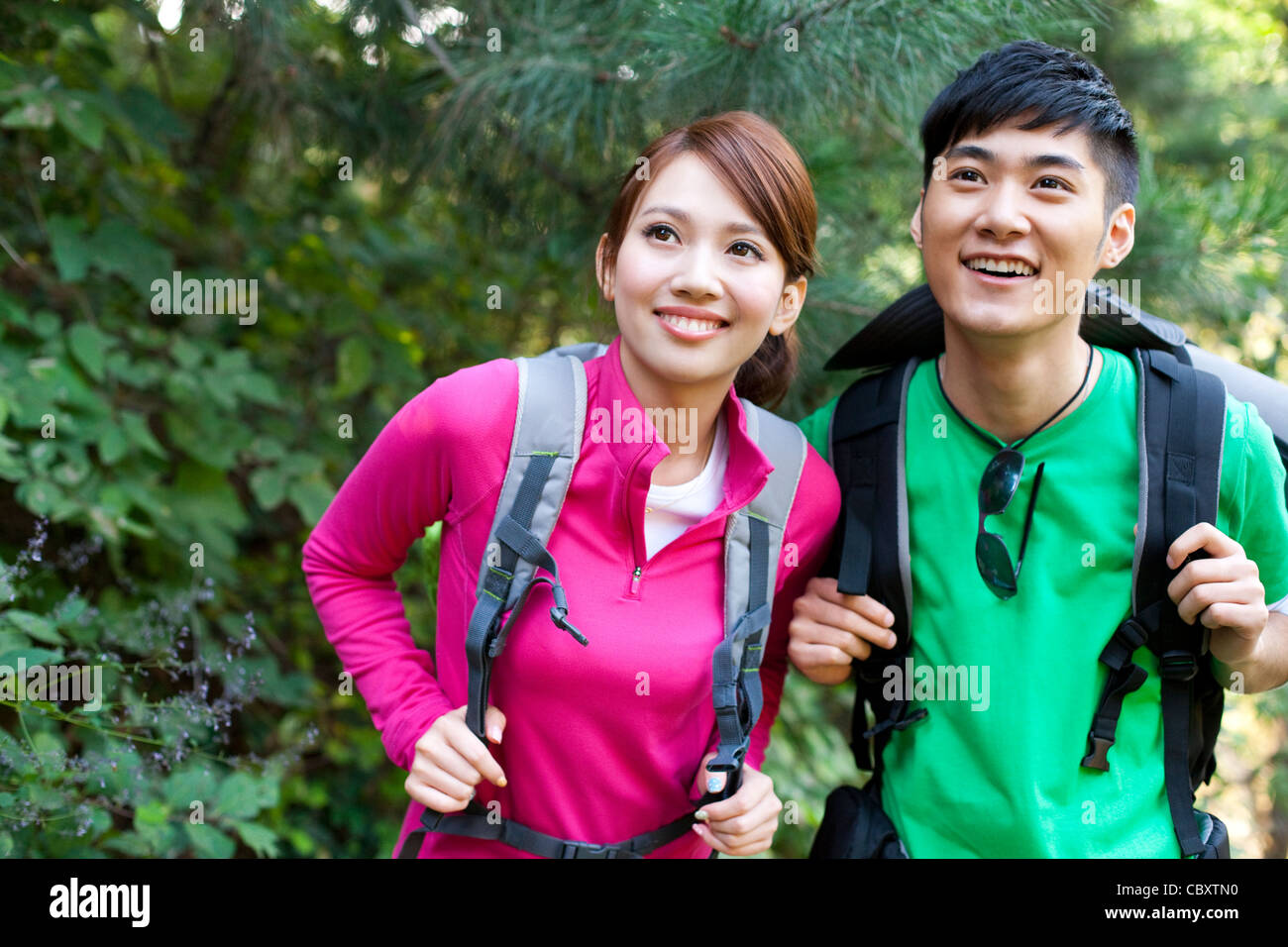 Young people go hiking in mountain Stock Photo
