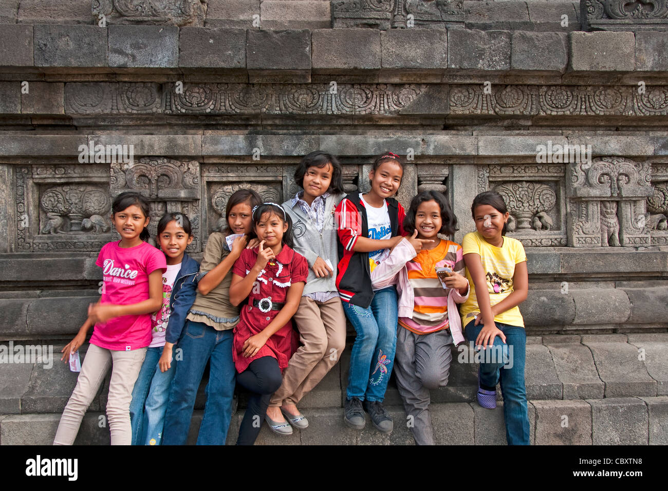 Young Indonesian girls at Prambanan Hindu Temple complex near Yogyakarta Stock Photo