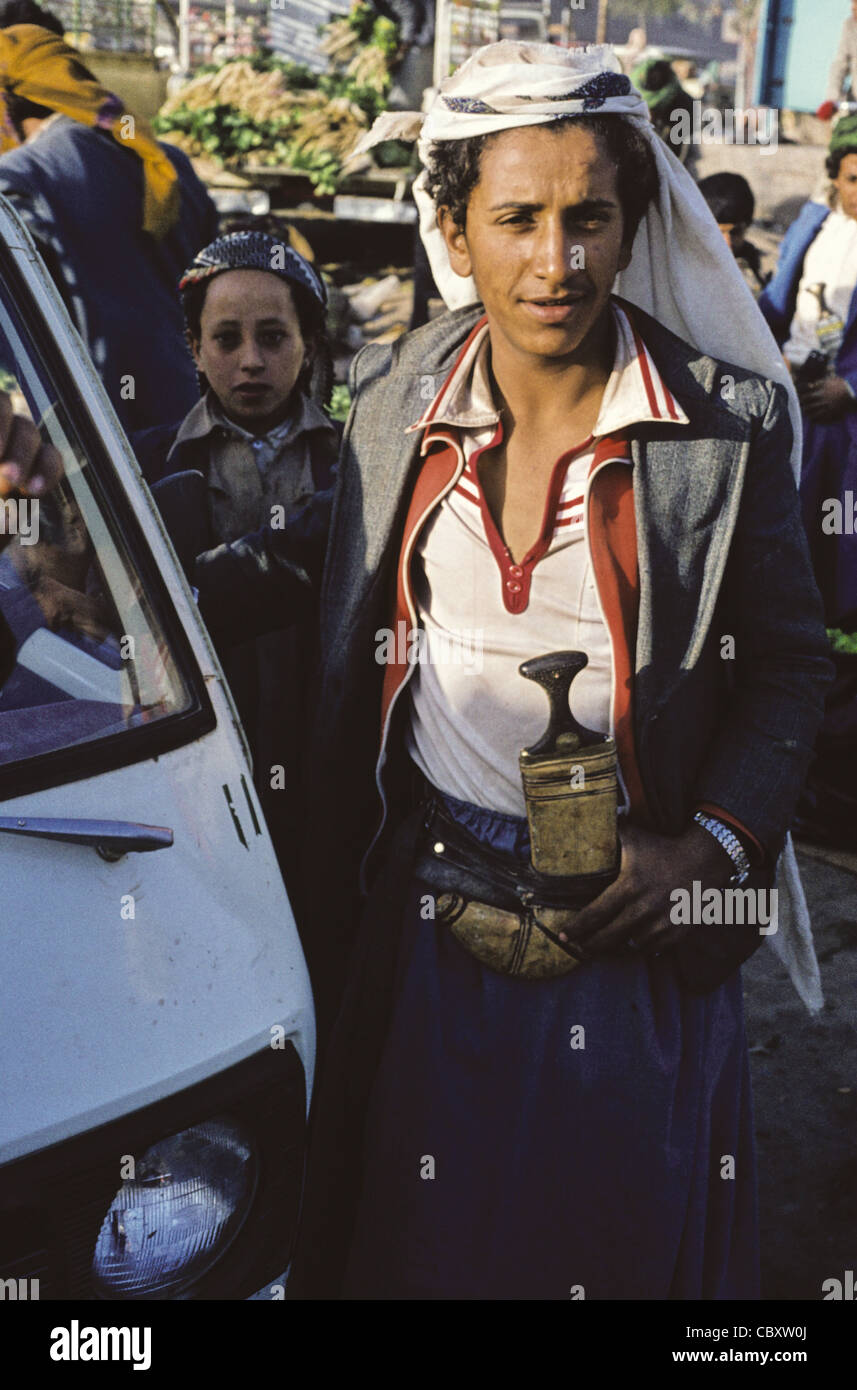 Portrait of a young Yemeni man wearing a jambiya in Sana’a, Yemen Stock Photo