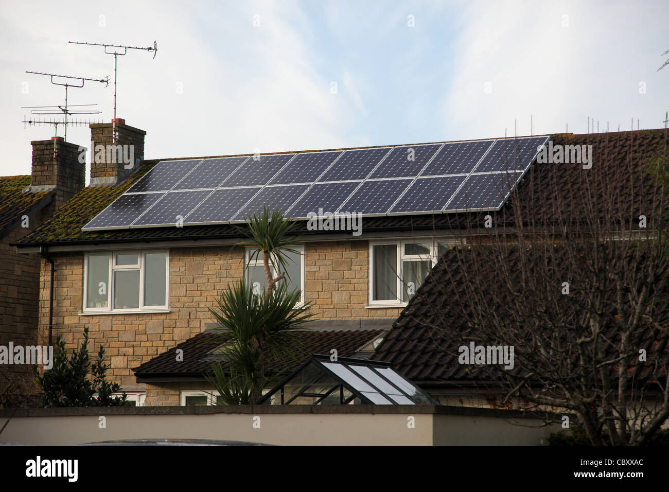 Modern house with solar panels hi-res stock photography and images - Alamy