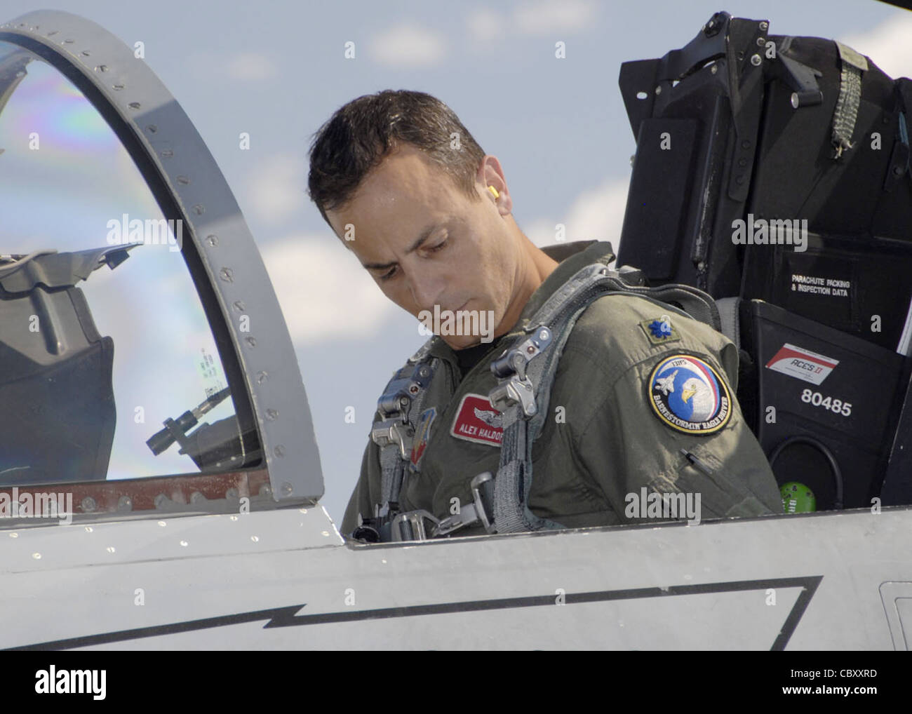 Lt. Col. Alex Haldapolus makes final checks prior to taking off from Nellis Air Force Base, Nev., Aug. 25 for a Red Flag training mission. Red Flag offers pilots and ground crews training in actual wartime scenarios to increase their combat skills. Colonel Haldapolus is an F-15 Eagle pilot with the Massachusetts Air National Guard's 104th Fighter Wing at Barnes Air National Guard Base in Westfield, Mass. Stock Photo