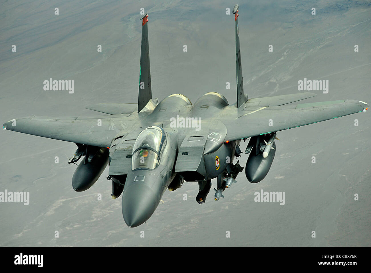 An F-15E Strike eagle conducts a mission over Afghanistan on Oct. 7. The F-15E Strike Eagle is a dual-role fighter designed to perform air-to-air and air-to-ground missions. An array of avionics and electronics systems gives the F-15E the capability to fight at low altitude, day or night, and in all weather Stock Photo