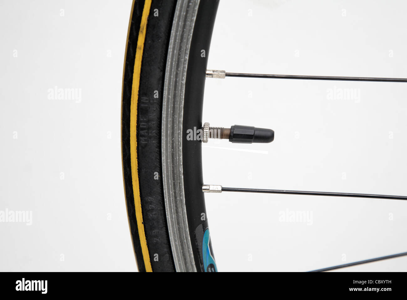 bike wheel tyre tire presta valve spokes nipple rim racing bicycle narrow aero section Stock Photo