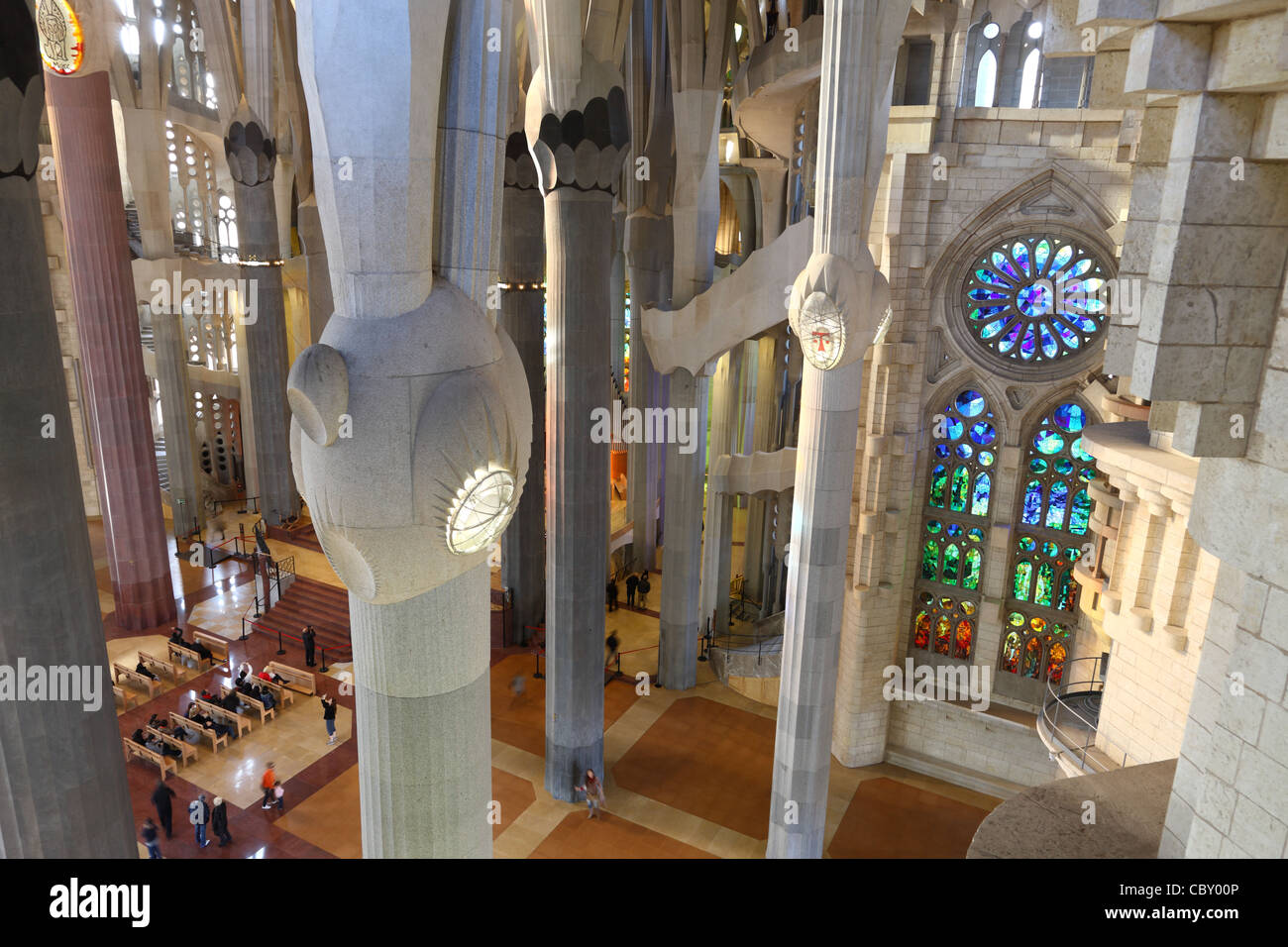 Architecture detail of windows, ceiling and pillars in La Sagrada Familia, Barcelona by Gaudi Stock Photo