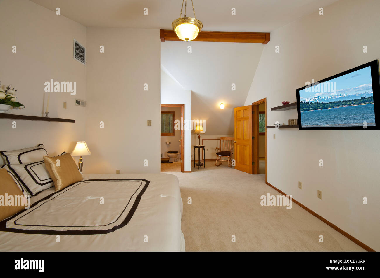Master Bedroom In Luxury House Showing Reading Area And
