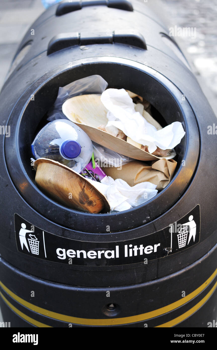Full rubbish bin at Covent Garden, 'West End', London. Stock Photo