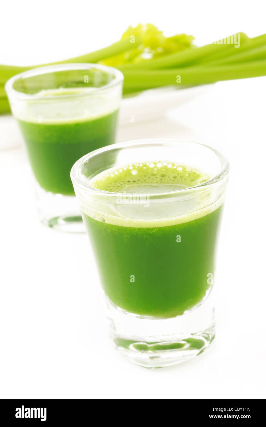 glass of fresh celery juice on white background Stock Photo