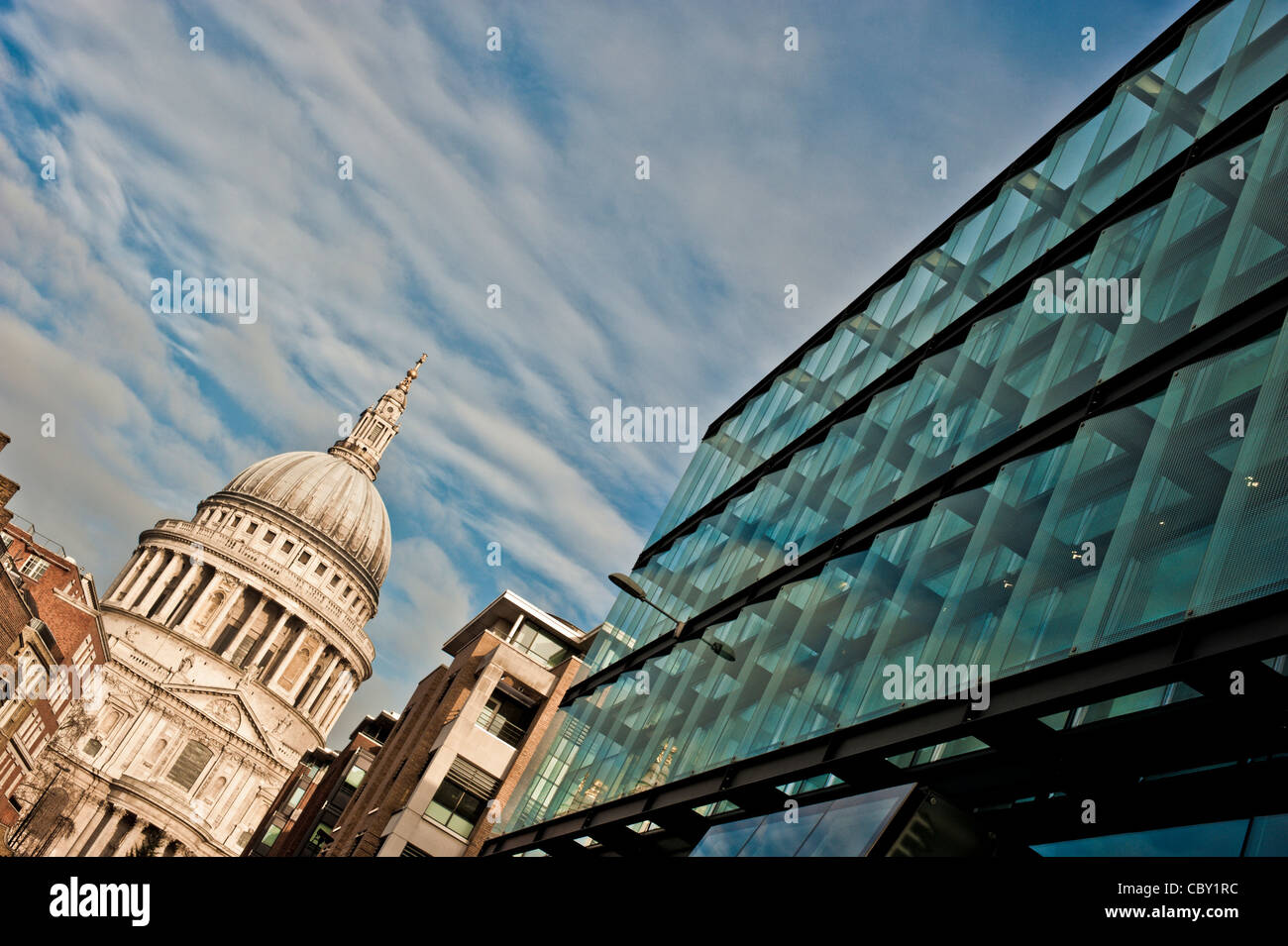 St Paul's Cathedral traditional architecture with contemporary glass and steel building of the Salvation Army HQ in the foreground. London. Stock Photo