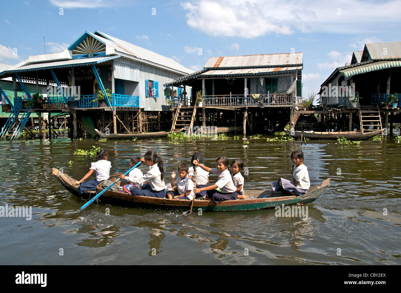 school girls and school boys going to school, Kampong Phluk, Tonle Sap lake, Cambodia Stock Photo