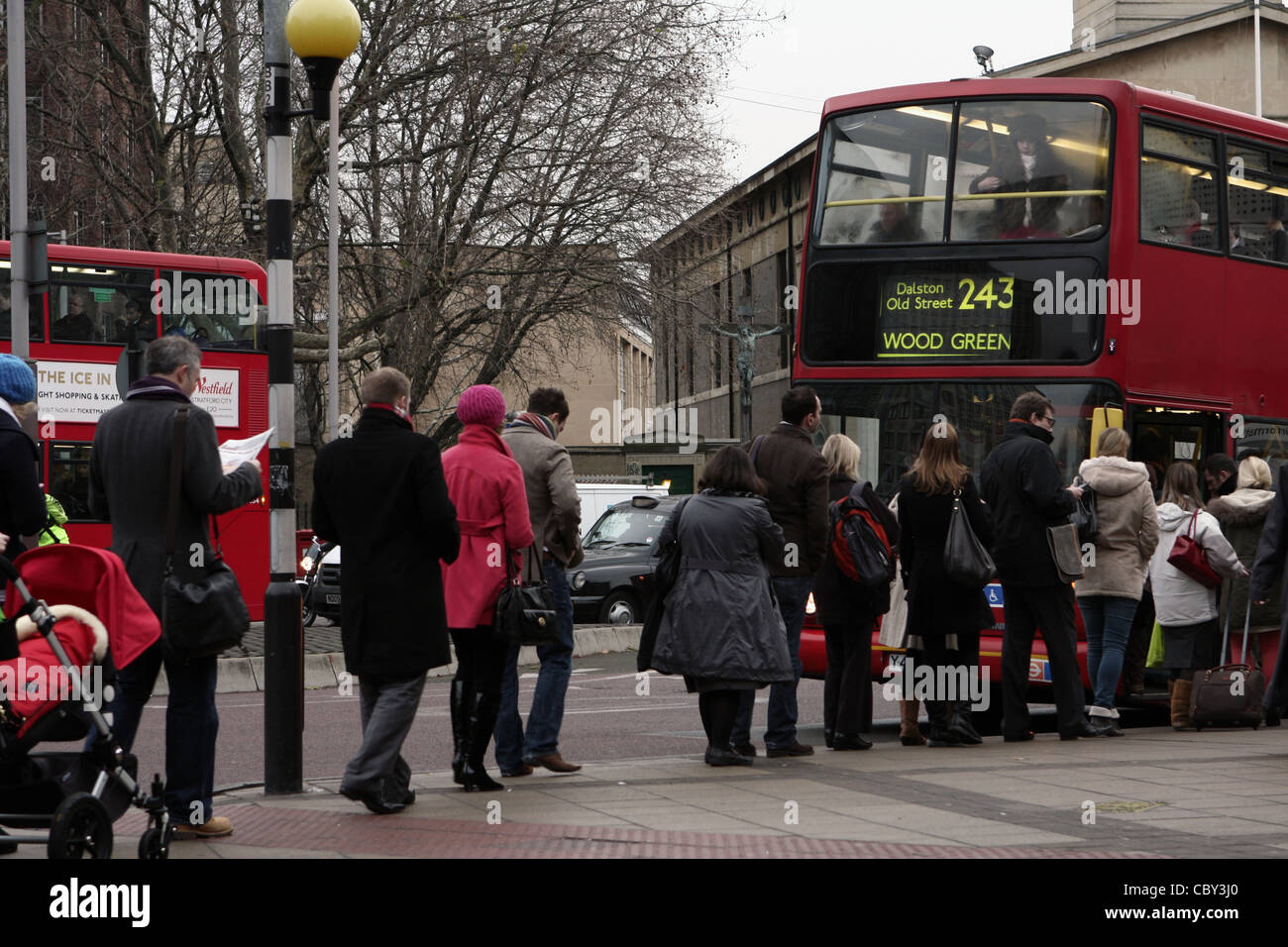 Line people queuing bus stop hires stock photography and images Alamy