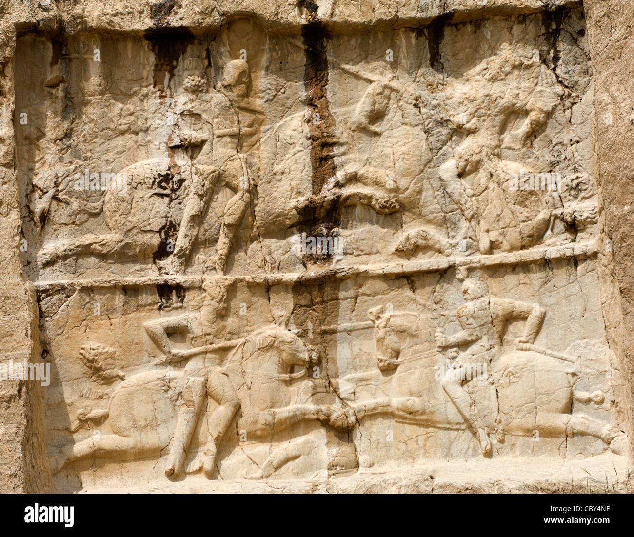 This stone relief at Naqsh-e Rostam near Persepolis, Iran, shows the ...