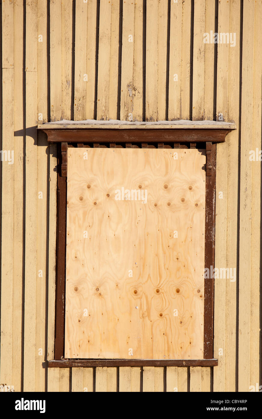Window covered with plywood sheet , Finland Stock Photo Alamy