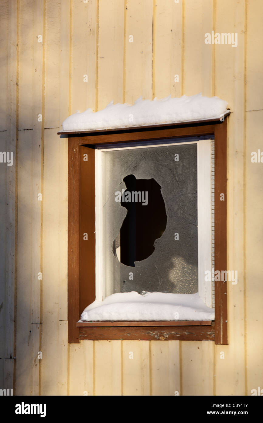 Isolated broken window at Winter , Finland Stock Photo