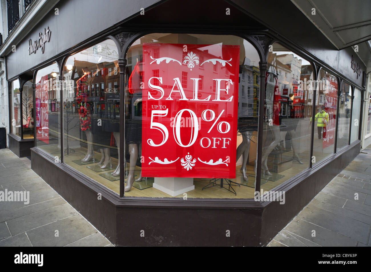 Boxing day sale posters in a shop window Stock Photo
