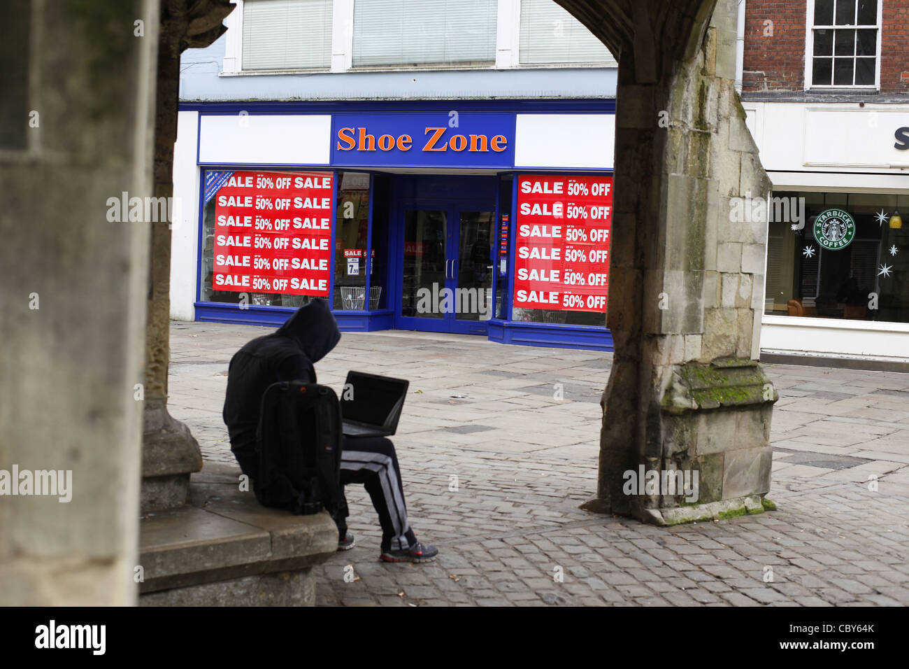 Boxing day sale posters in a Shoe Zone shop window Stock Photo Alamy