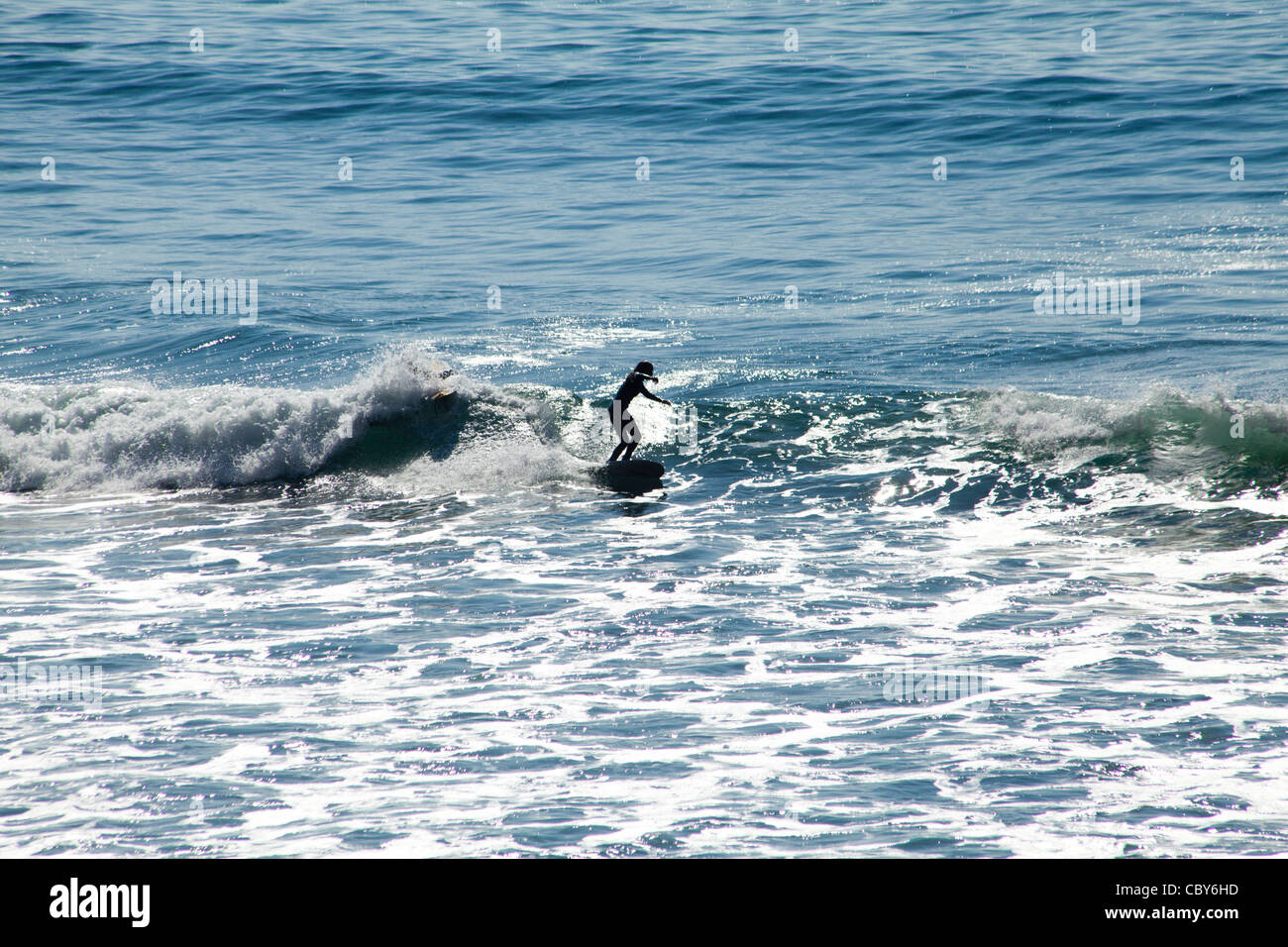Surfer rides a wave during the annual ONeill Surfing Competition in