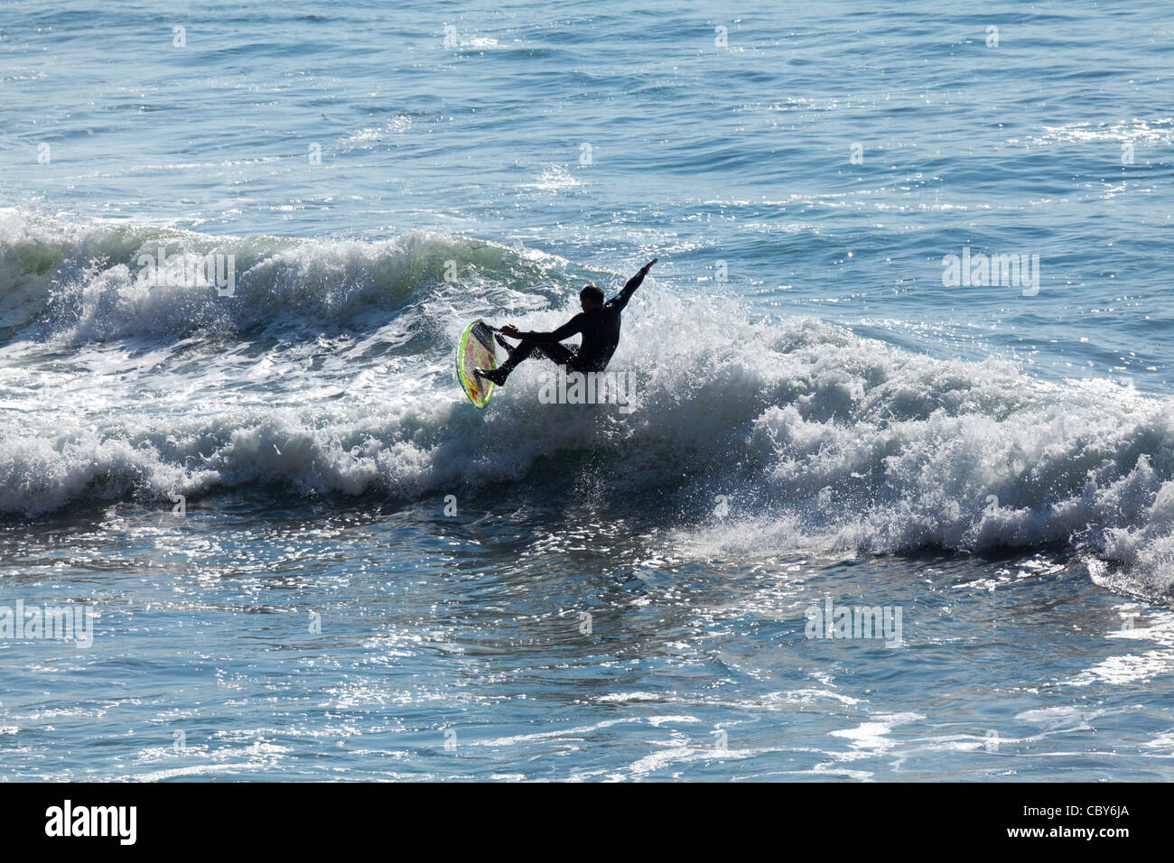 Surfer catches air in the annual ONeill Surfing Contest on the Pacific ...