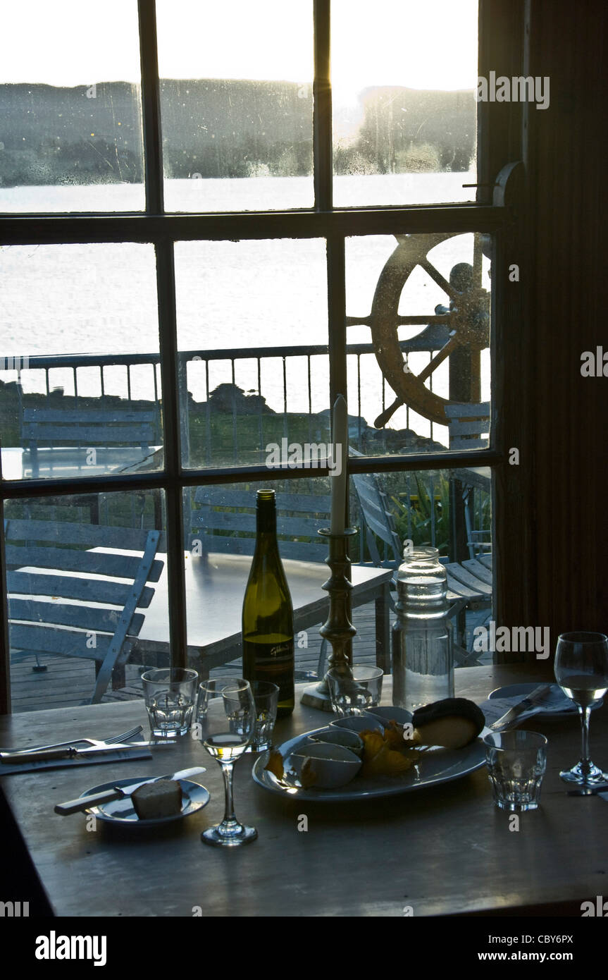 meal on rustic table in front of window Stock Photo - Alamy