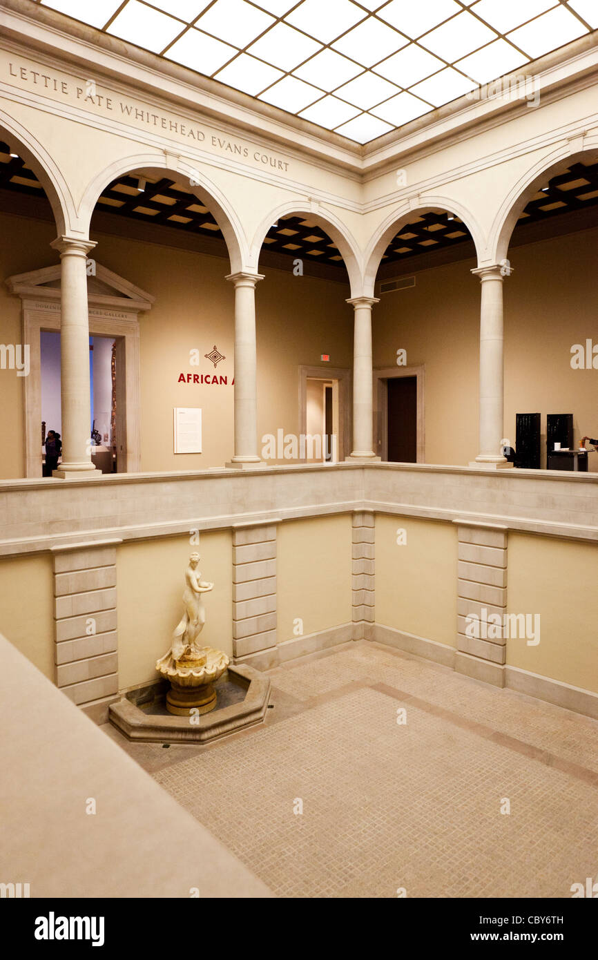 Great room in Picasso exhibit with columned arches and fountain Stock Photo