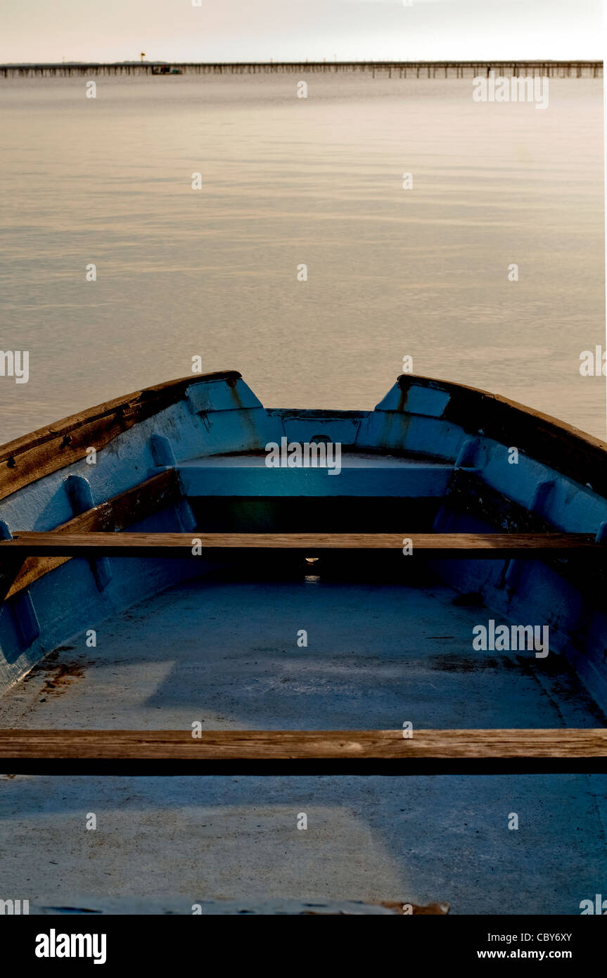 Detail of moored boat at Bouzigues on the Étang de Thau.Oyster beds in the distant background. Stock Photo