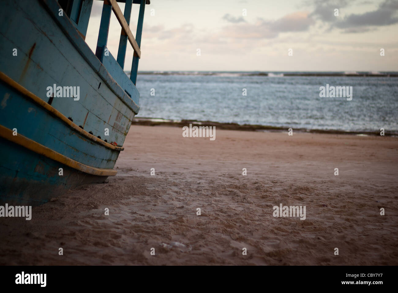 Stranded blue boat in praia do Frances, Maceio - Alagoas, Brazil Stock Photo