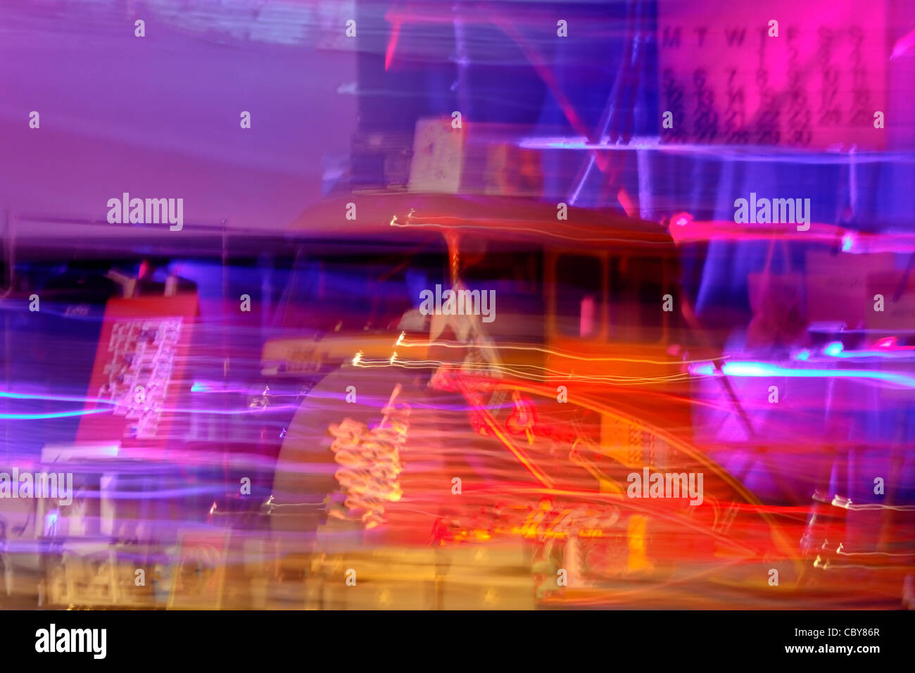 Motion blur ghostly landscape of Mumbai rickshaw and a high street at