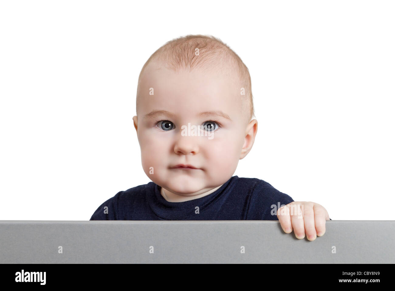 young child holding sign. isolate on white background Stock Photo