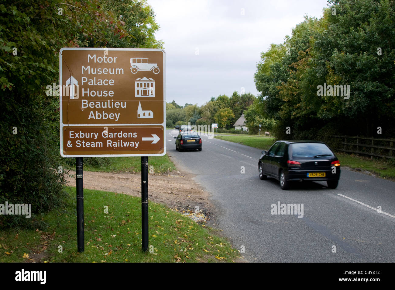 A brown Visitors' road sign leading to the National Motor Museum at Beaulieu in the New Forest, Britain Stock Photo