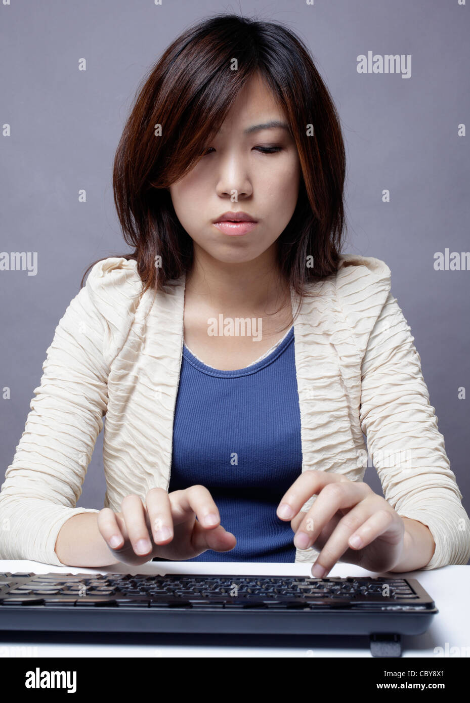 Office lady uses notebook computer Stock Photo - Alamy