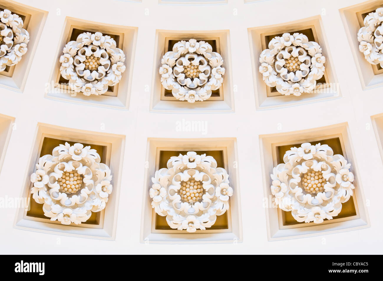 Plasterwork white roses of Yorkshire on the ceiling of the Council Chamber in the Guildhall. Hull, East Yorkshire. Stock Photo