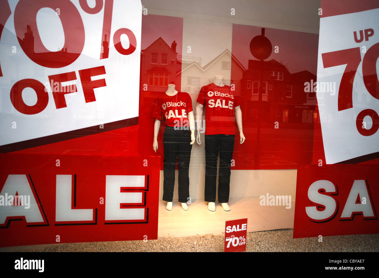 Boxing day sale posters in a Blacks shop window Stock Photo