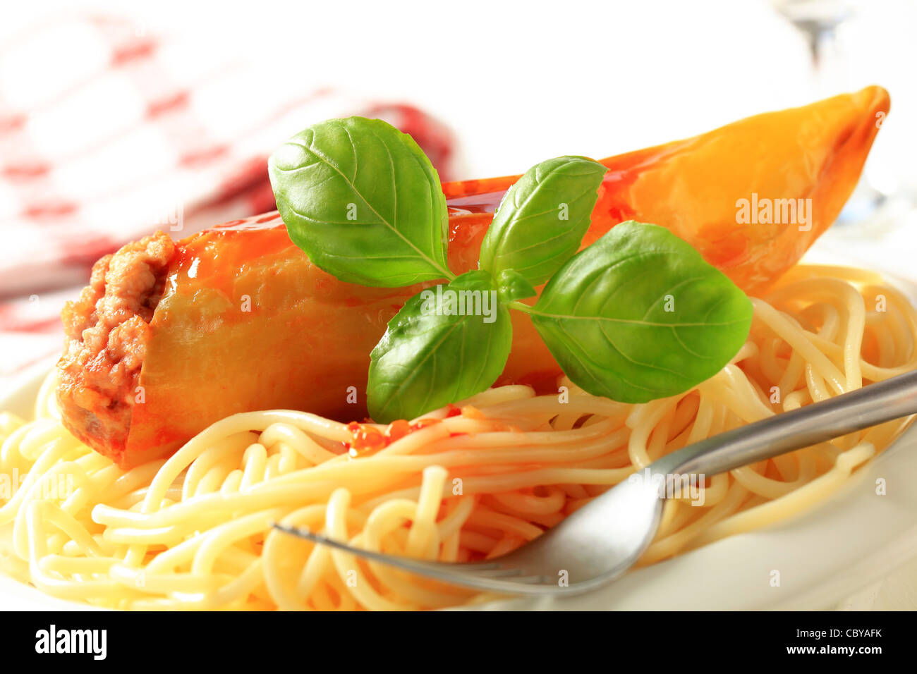 Hungarian pepper stuffed with minced meat served with spaghetti Stock Photo