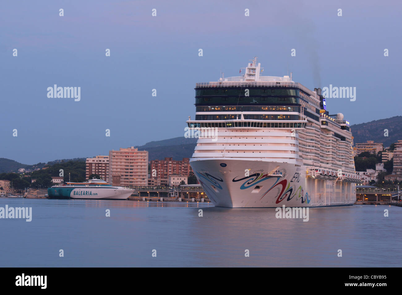 Pre dawn arrival - Norwegian Cruise Line (NCL) Cruise Liner 'Norwegian Epic' in Port of Palma de Mallorca Stock Photo