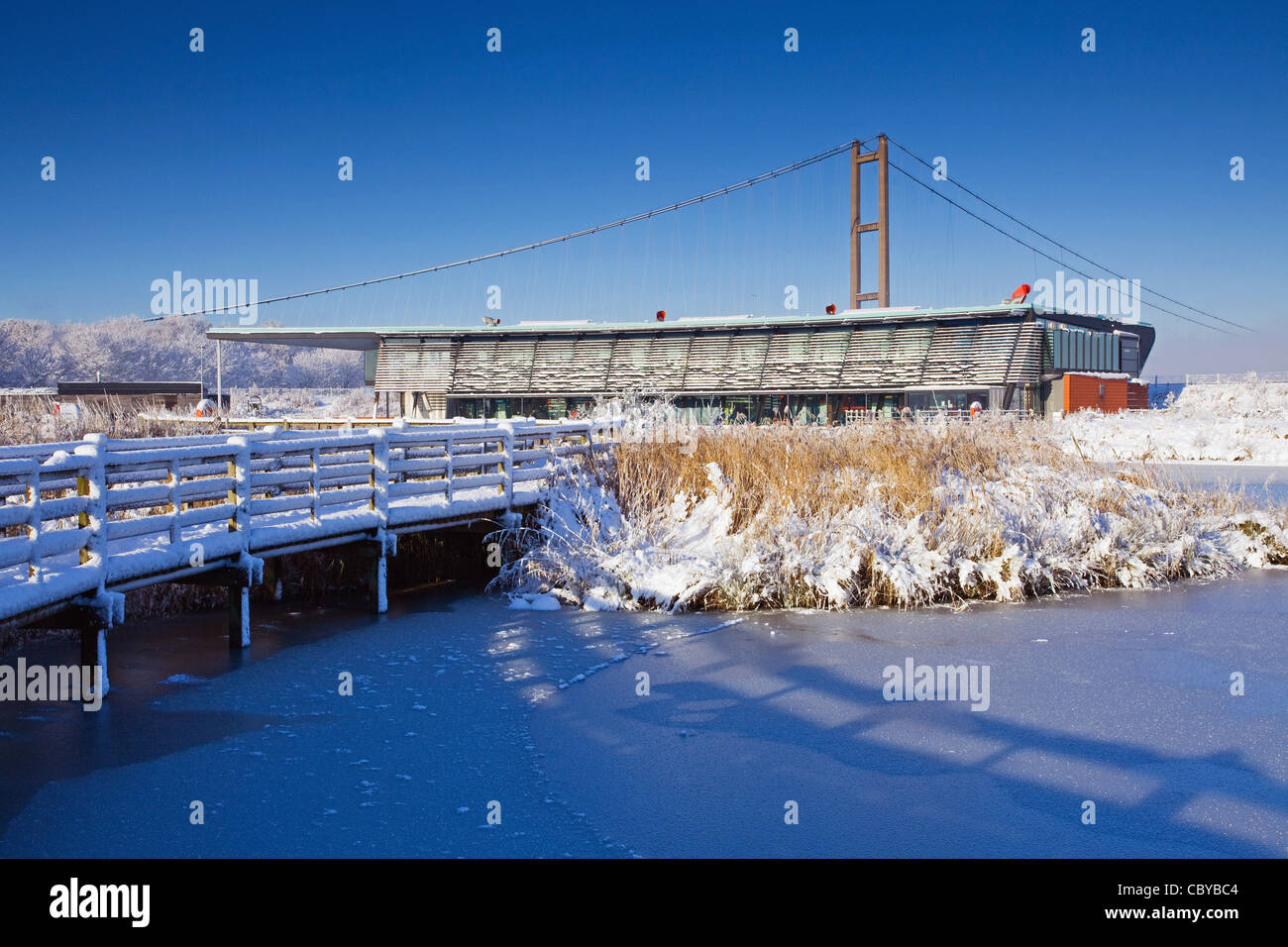 The Humber Bridge over the Waters' Edge Country Park Visitor Centre in North Lincolnshire in winter Stock Photo