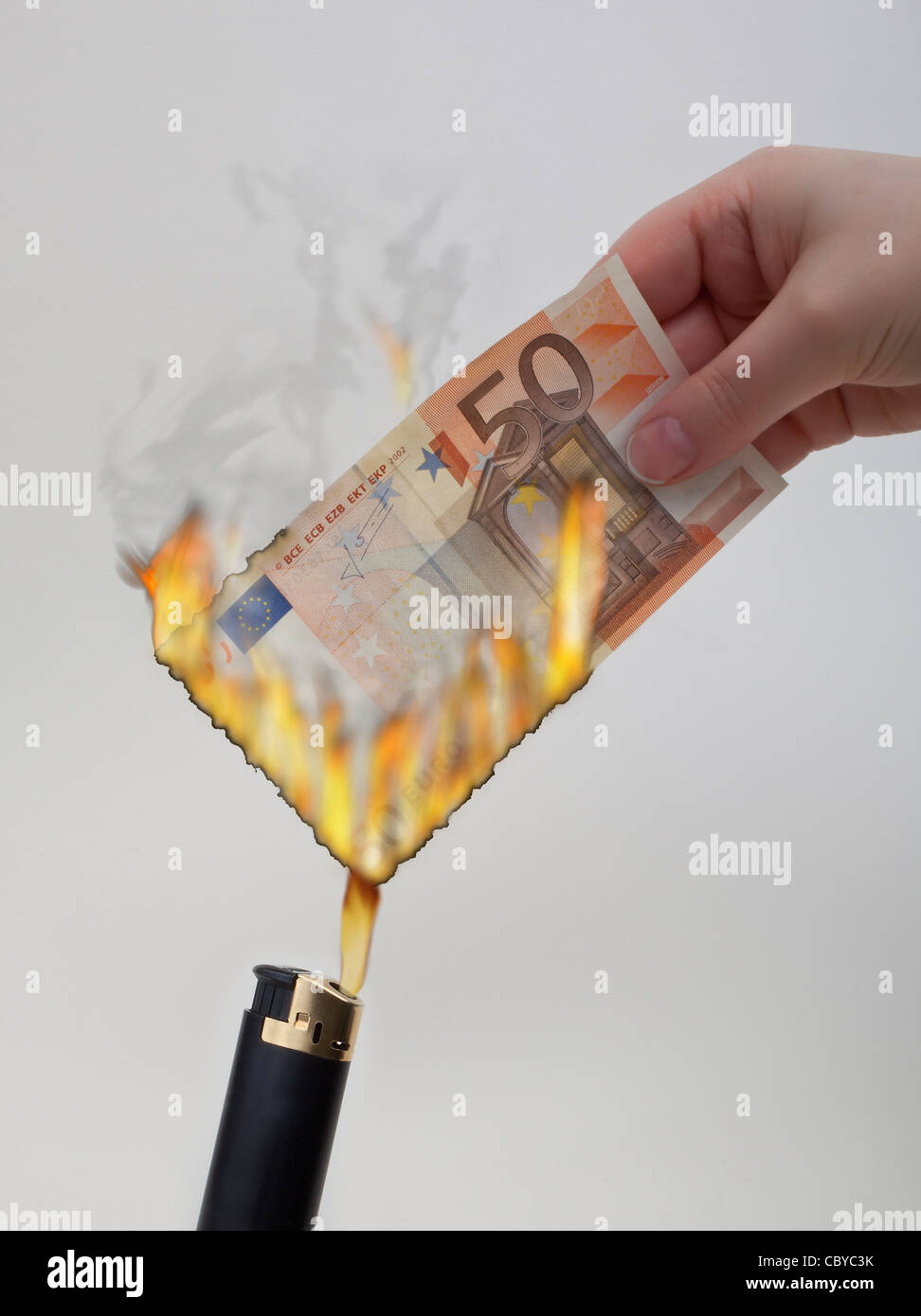 Euros burning Stock Photo
