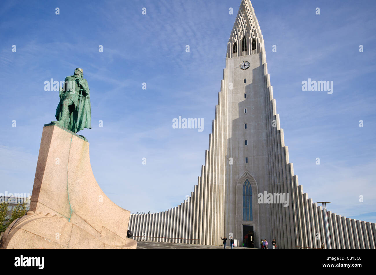 Outside the Hallgrímskirkja church, Reykjavik, Iceland. Also, an Alexander Calder statue of Leif Ericson. Stock Photo