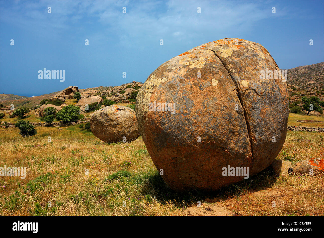 Surreal landscape with huge, round and smooth rocks close to Volax (or 'Volakas') village, Tinos island, Cyclades, Greece Stock Photo