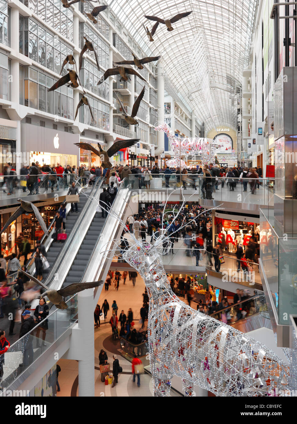 Toronto Eaton Centre shopping mall full of people on Boxing day in 2011. Toronto, Ontario, Canada. Stock Photo