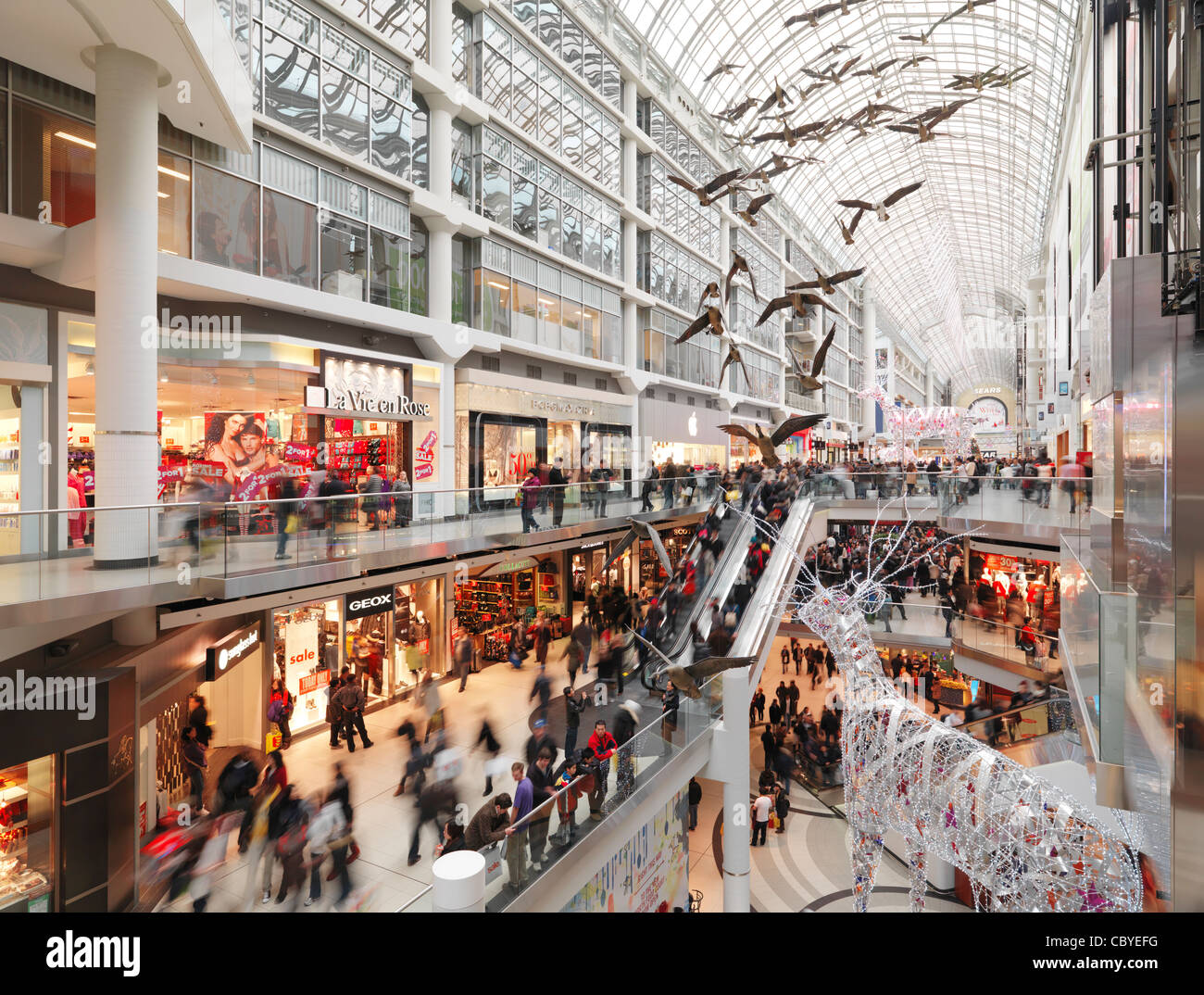 Eaton Centre largest shopping mall in downtown Toronto full of people on  Boxing day in 2011. Ontario, Canada Stock Photo - Alamy