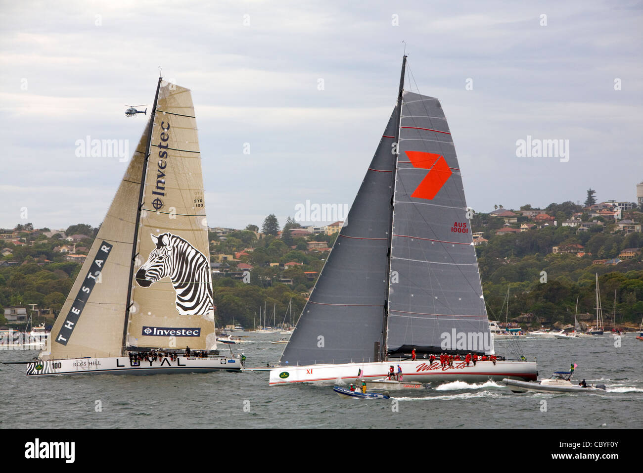 investec loyal and wild oats x1 at the start of the 2011 sydney to hobart yacht race. these yachts finished first and second Stock Photo