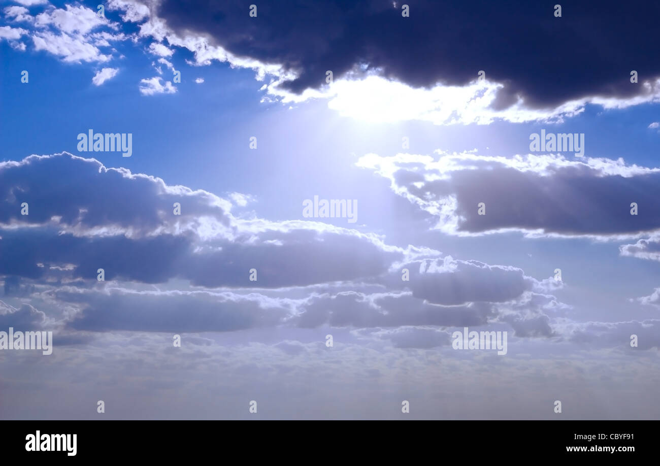 blue sky with clouds and sunlight Stock Photo - Alamy