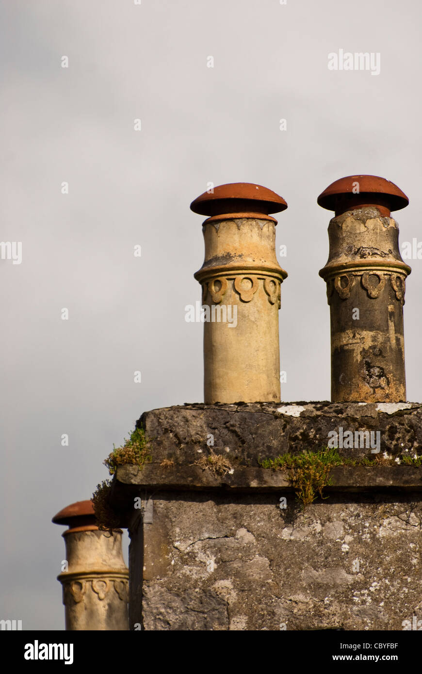 old fashioned chimney pots Stock Photo - Alamy