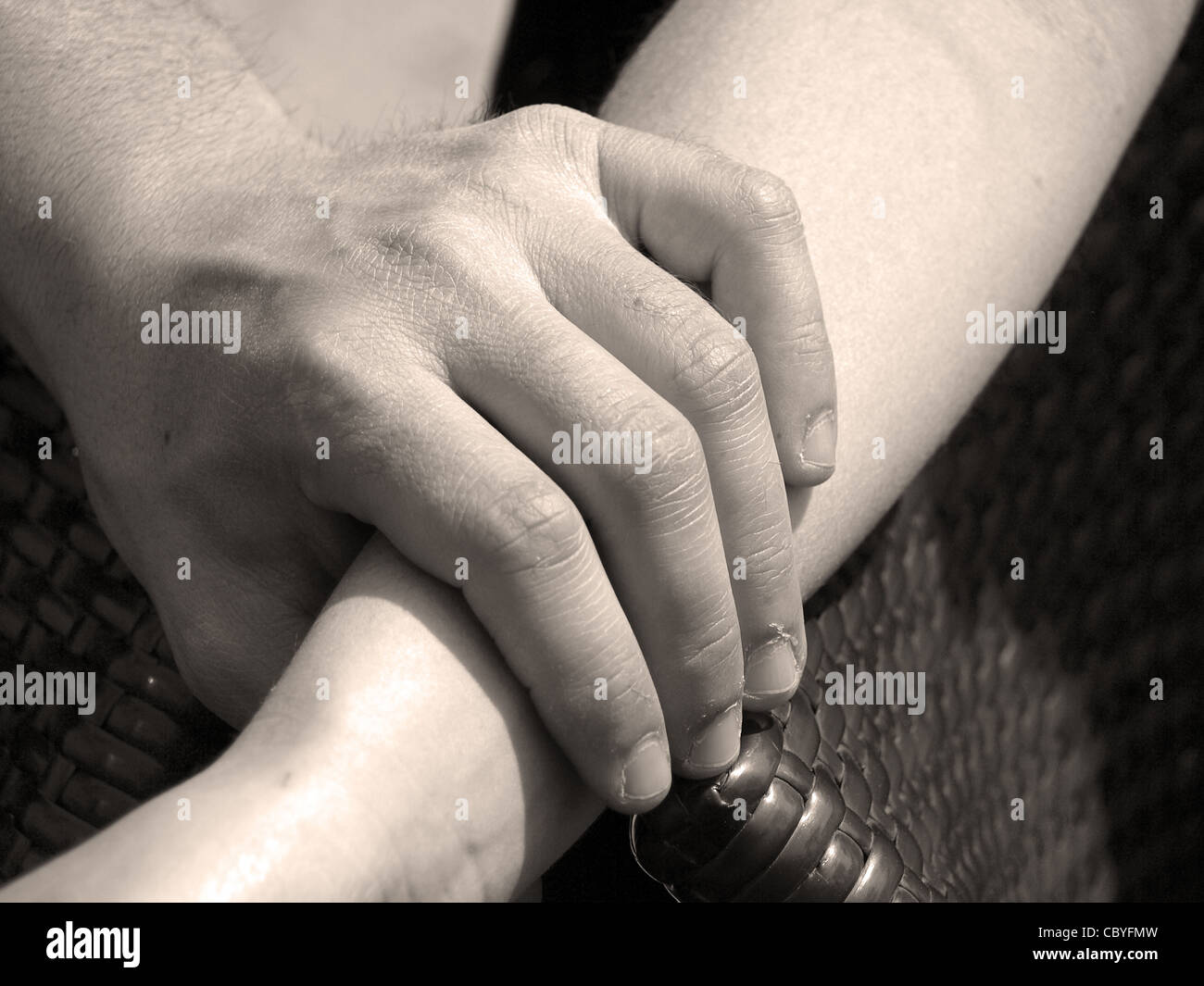 Catch A Hand a man hand that catch a woman wrist Stock Photo - Alamy