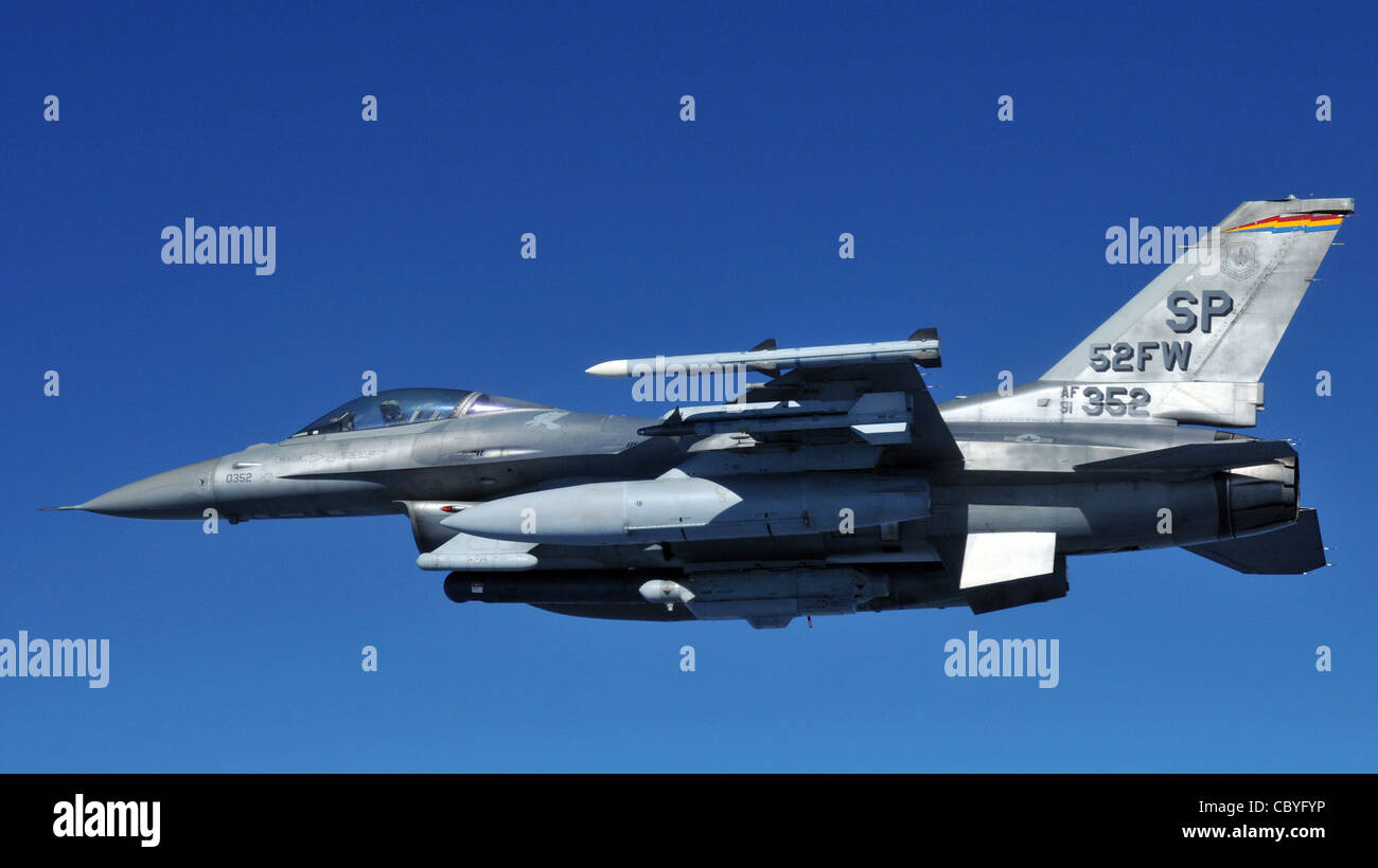 Prior to flying operations being grounded, an F-16 Fighting Falcon from Spangdhalem Air Base, Germany, flies off the wing of a 100th Air Refueling Wing KC-135 Stratotaker during Exercise Brilliant Ardent April 15, 2010, at Royal Air Force Mildenhall, England. Stock Photo