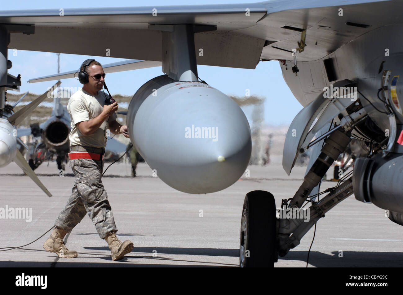 Staff Sgt. William Reeder goes over pre-flight checks before launching ...
