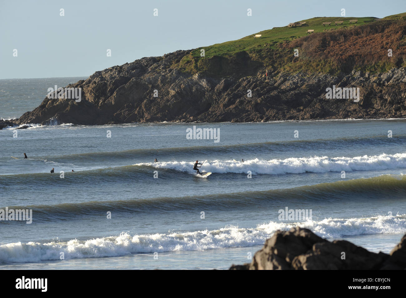 Stand up paddleboarding, Langland Bay, Gower South Wales UK Stock Photo